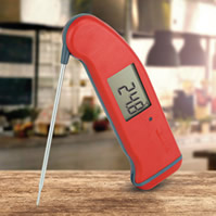 Enhanced thermometer features self-rotating display