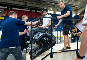 Motors drive exoskeletons to help paraplegics walk