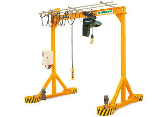 Two cranes to facilitate both interior and exterior load travel