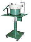 Elscint vibratory feeder for steel tubes