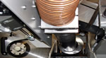 Swarf Vaccuum unit benefits mass-production sawing of bearing races